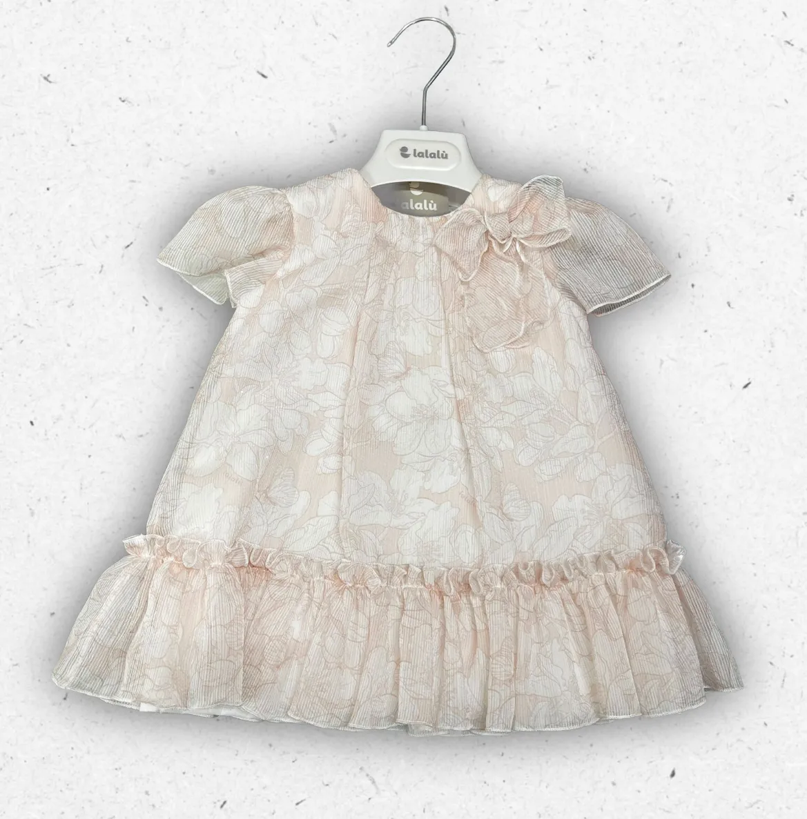 Abitino da neonata Lalalù color rosa cipria con parte superiore in cotone a maniche lunghe, colletto tondo e gonna in tulle vaporosa con dettagli a pois.
