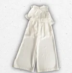 Abito tuta elegante da ragazza Alice Pi. color avorio, jumpsuit da cerimonia con design fluido e produzione sartoriale italiana. 1