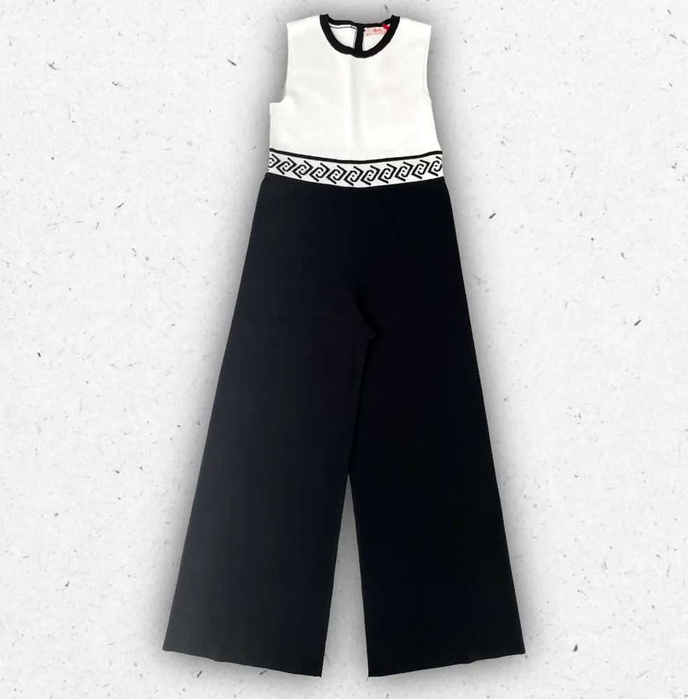 Tuta intera in maglia Liu Jo per ragazza, design bicolore bianco e nero con pantaloni fluidi e stile elegante.