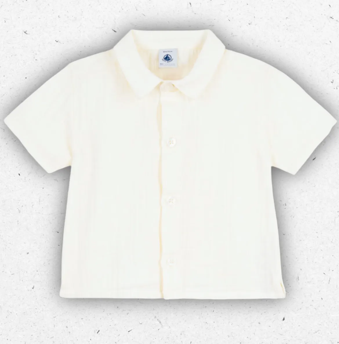 Camicia a maniche lunghe da bambino Petit Bateau in freschissima garza di cotone con chiusura a bottoni frontali.