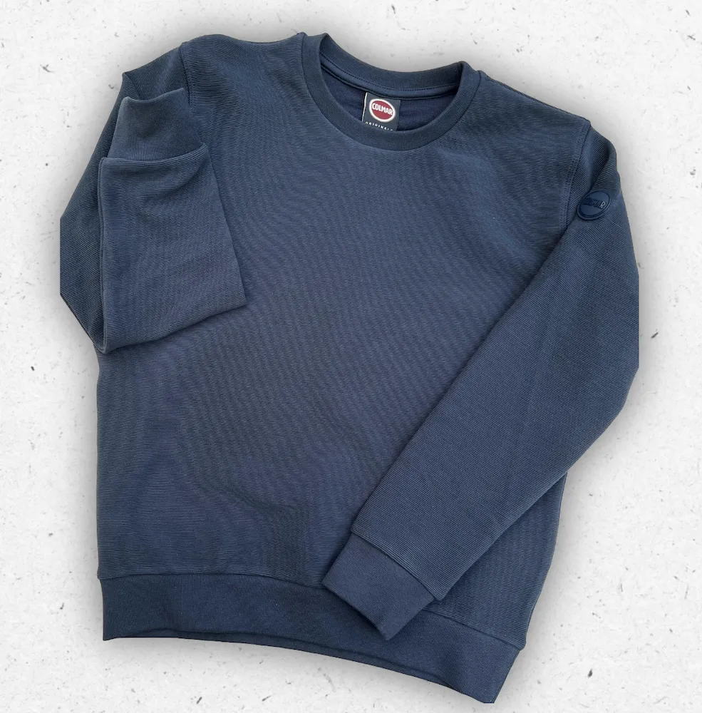 Felpa girocollo da ragazzo Colmar Originals in cotone, disponibile nei colori blu e canapa con patch logo sulla manica.