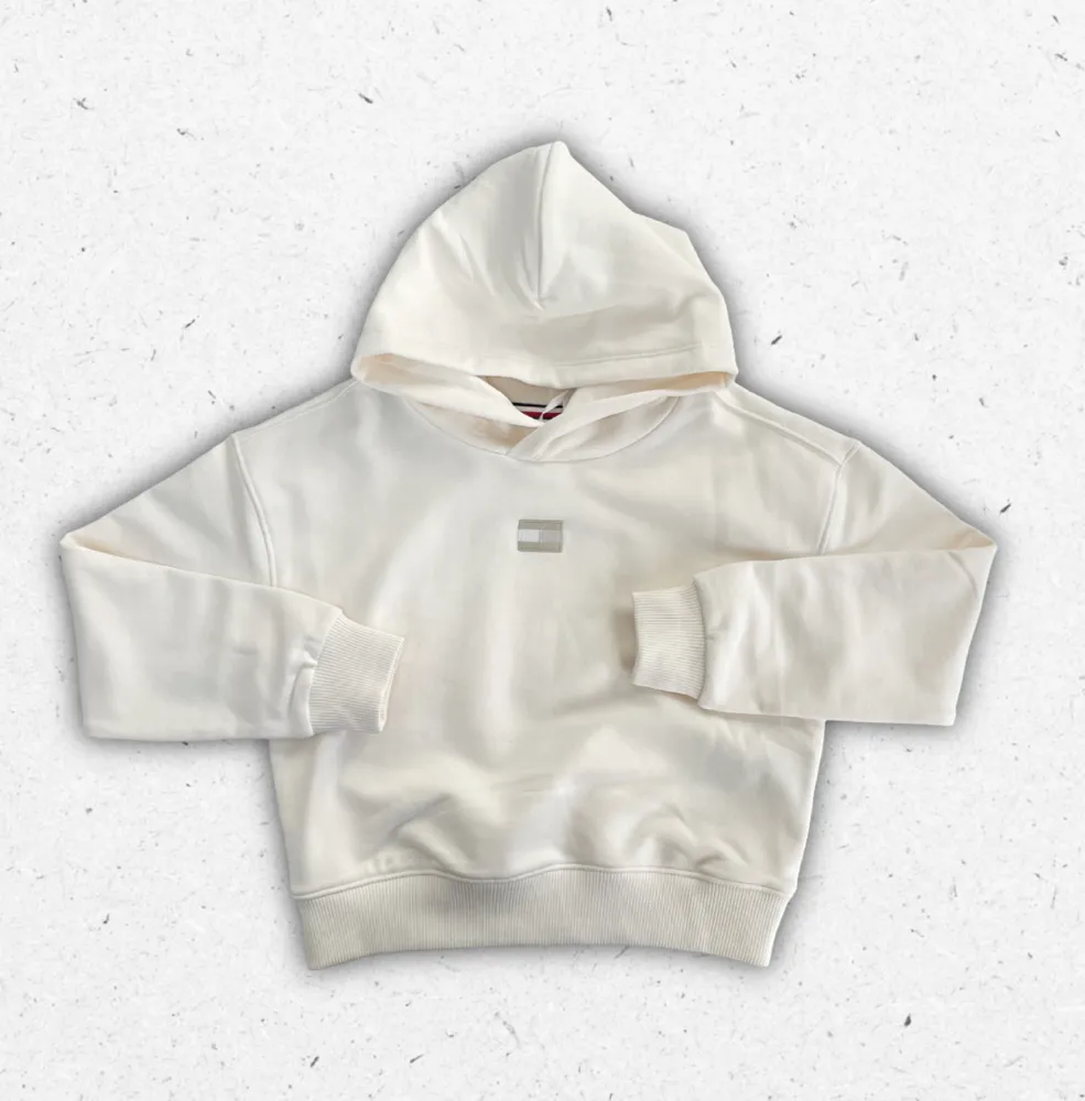 Felpa con cappuccio Tommy Hilfiger da ragazza in cotone con tasca a marsupio e logo bandierina ricamato.