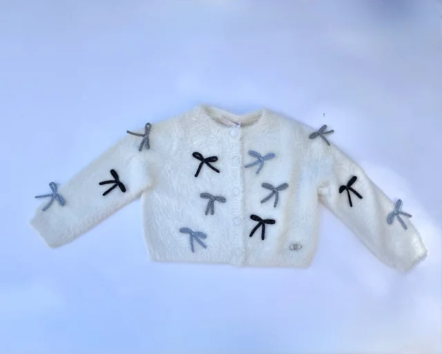 Maglia aperta maniche lunghe bianca con fiocchi Liu Jo per bambina