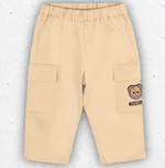 Pantalone modello cargo da neonato firmato Moschino Kids in gabardina di cotone beige con tasche laterali e ricamo dell'orsetto Teddy Bear. 1