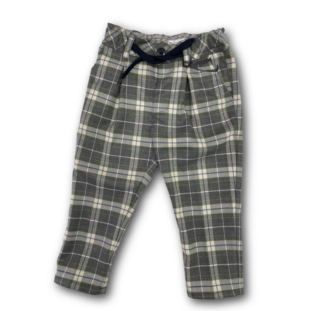 Pantalone Jeckerson per neonato in fresco lana fantasia tartan grigia e verde, con vita elasticizzata e coulisse.