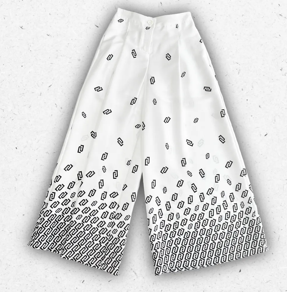 Pantalone da ragazza Liu Jo in bianco con stampa monogram nera all-over, stile contemporaneo e vestibilità elegante.