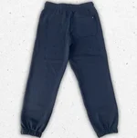 Pantalone jogger Tommy Hilfiger da ragazzo blu navy con elastico alle caviglie, coulisse in vita e patch logo flag sulla gamba. 1