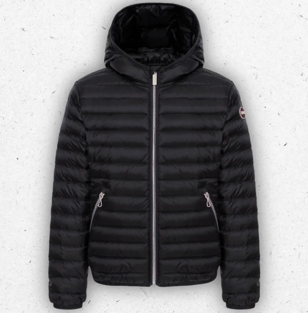 Piumino 100 grammi da bambina Colmar Originals in tessuto lucido rosa con cappuccio fisso e logo sulla manica.