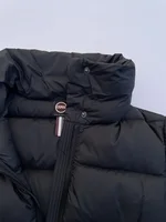 Piumino Colmar Originals nero da bambina con collo alto imbottito e polsini in maglia. 1