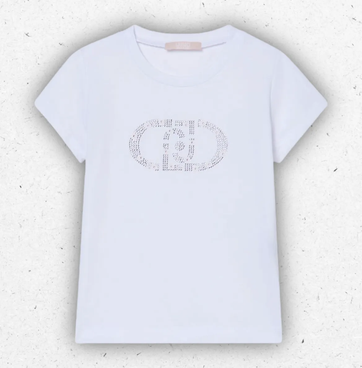T-shirt bianca da bambina Liu Jo Better in jersey di cotone con logo monogram frontale impreziosito da ricami gioiello.