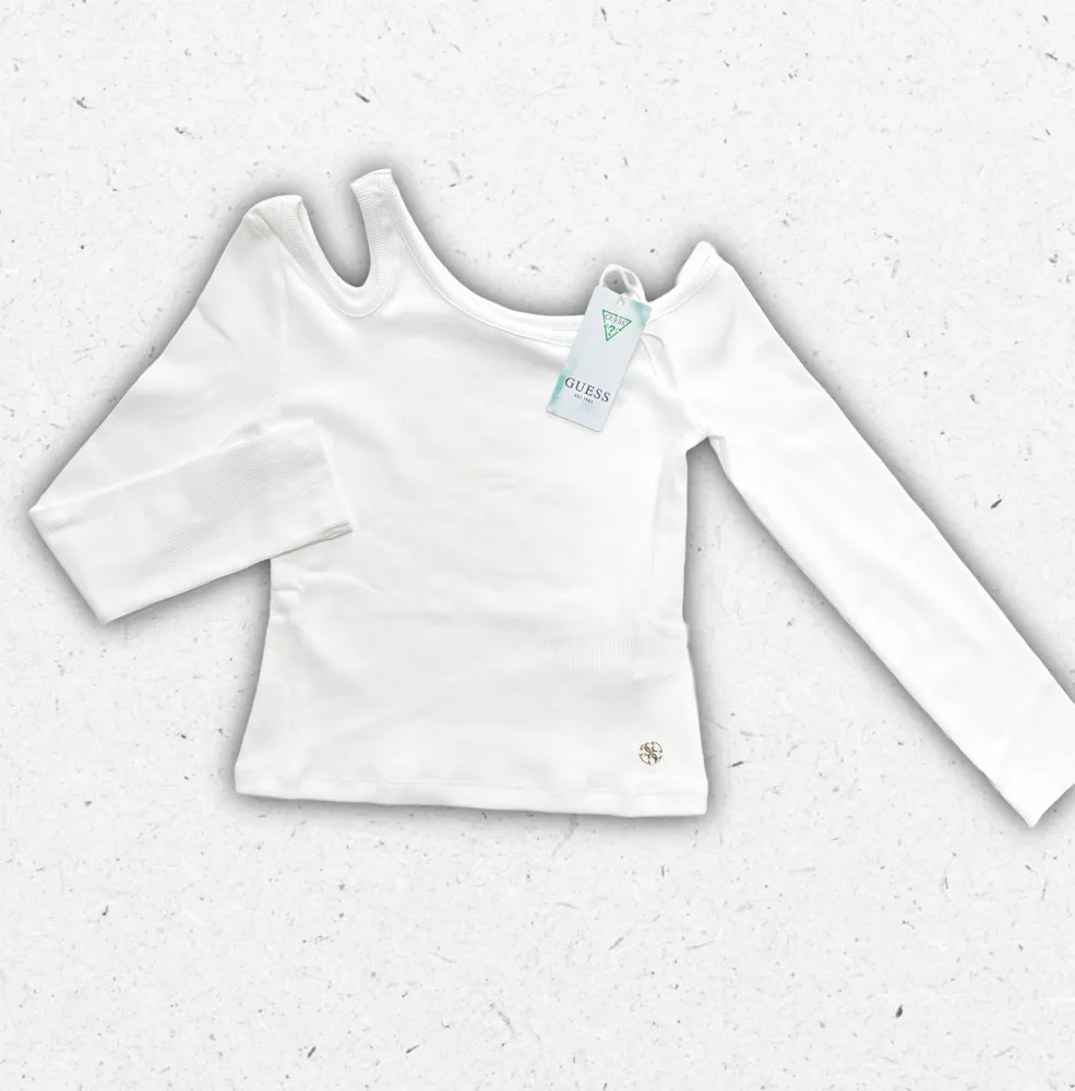 T-shirt a maniche lunghe Guess da ragazza in cotone con stampa logo frontale e vestibilità regolare.