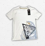 T-shirt Guess da ragazzo in cotone, mostrata nelle varianti blu navy e bianco con logo iconico stampato sul fronte. 1