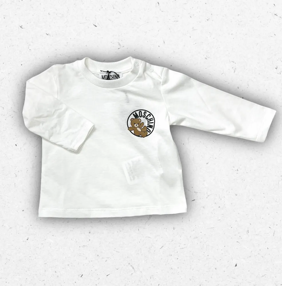 T-shirt bianca a maniche lunghe da neonato Moschino Baby con grafica circolare Teddy Bear e bottoni automatici sulla spalla.